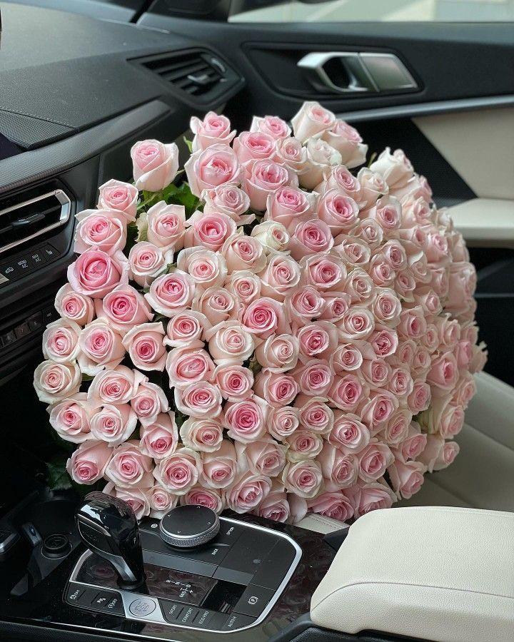 Professional floral arrangement in modern corporate setting